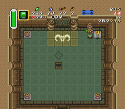 Proceed through the dungeon to this tile room. You can pick up an extra small key here. Then turn around.